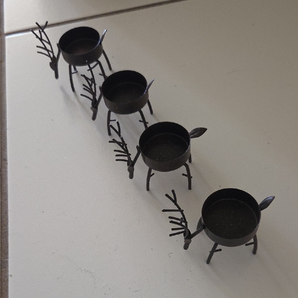 Set of Four Metal Reindeer Candle Holders